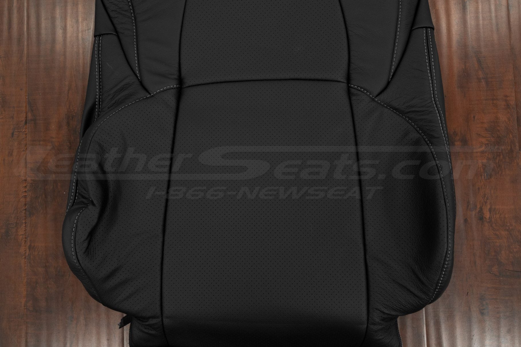 Perforated Body + Wings section of black backrest upholstery