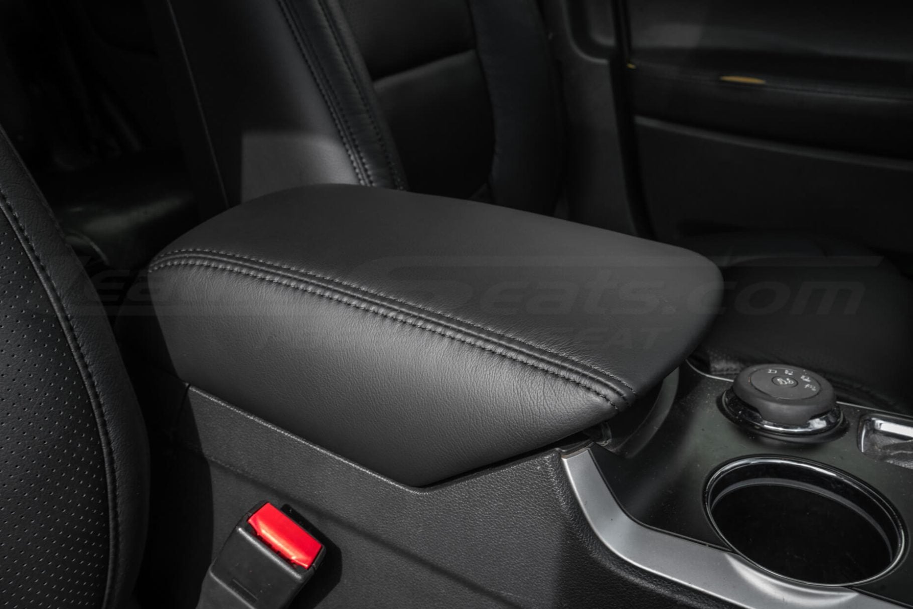 Black double stitching on ford explorer console cover
