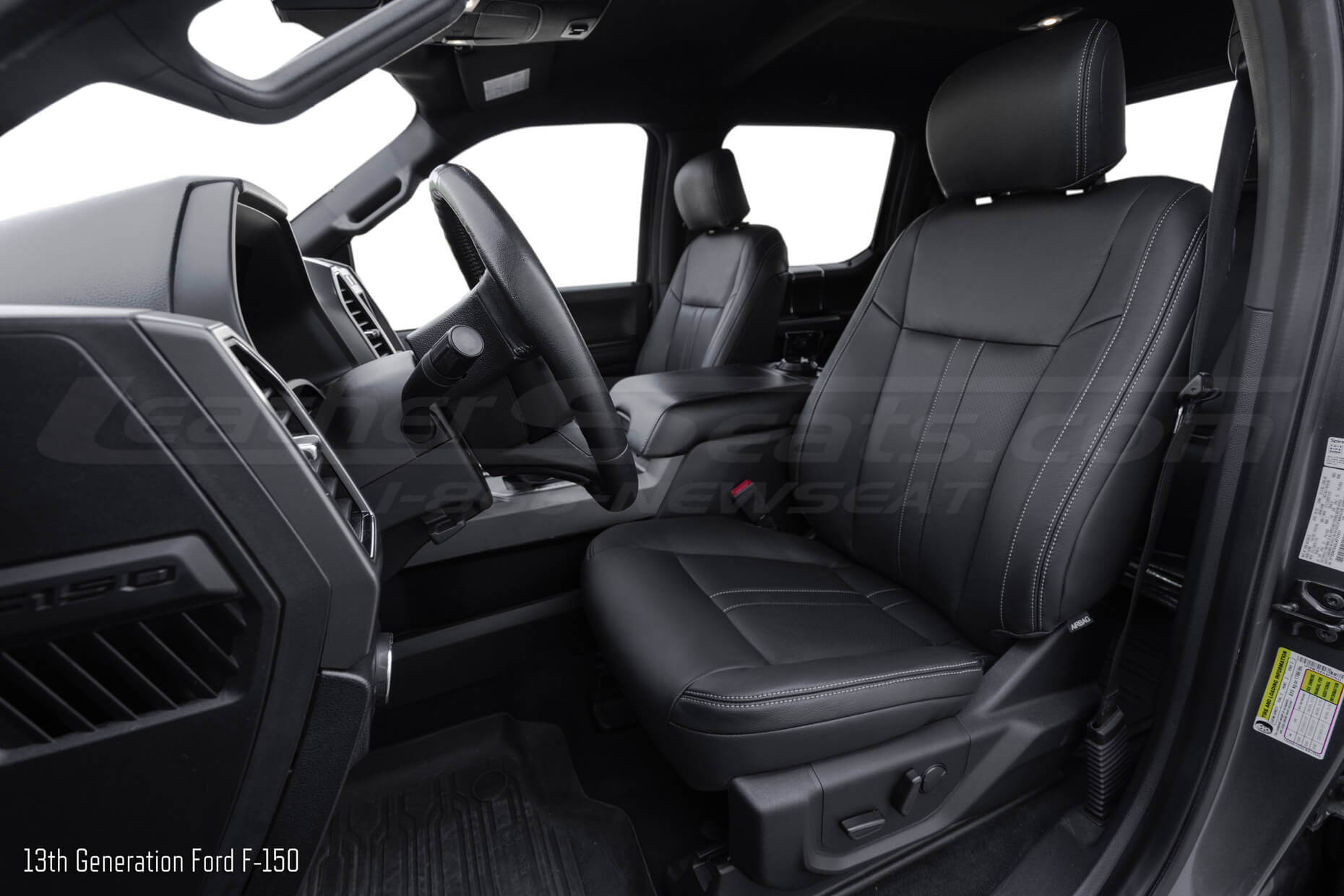 13th Generation Ford F-150 with aftermarket black leather seats