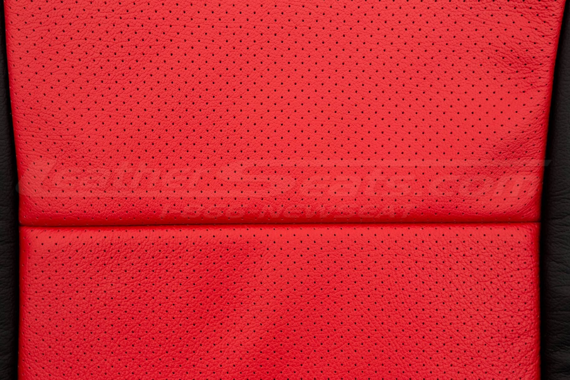 Bright Red perforated leather texture close-up