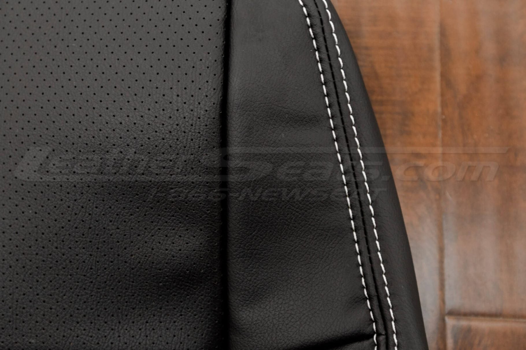 Contrasting Bone stitching on black leather