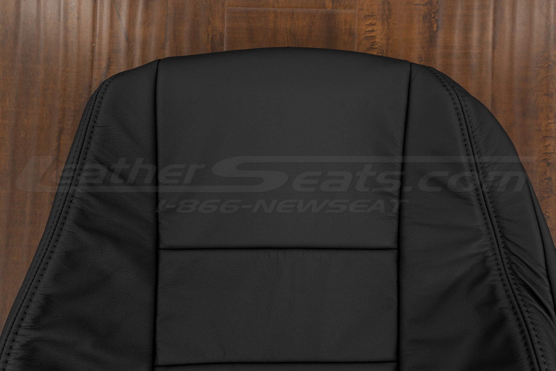 Upper section of Black leather backrest upholstery