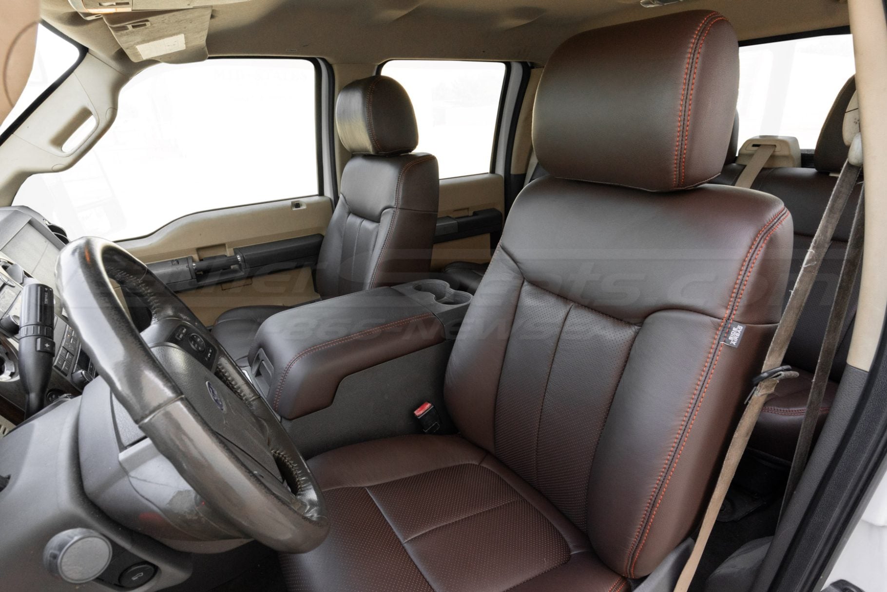 Backrest and headrest section of installed leather seat upholstery for ford superduty trucks