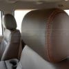 Ford Superduty with Coffee leather headrest cloe-up and contrasting tangerine orange stitching