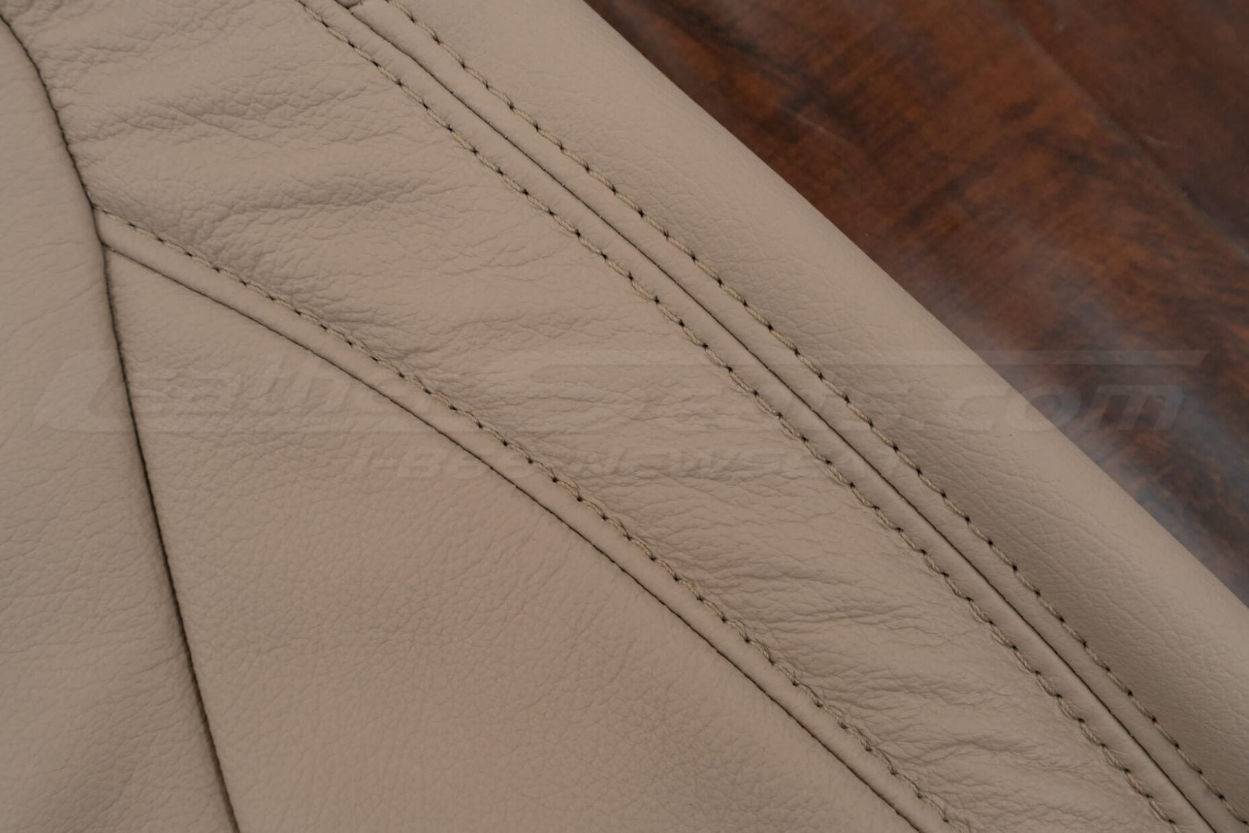Biscuit stitching on matching busicuit leather