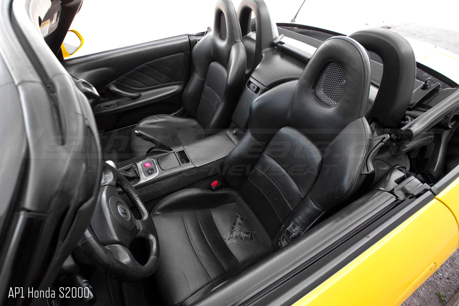 AP1 Honda S2000 with torn black leather upholstery