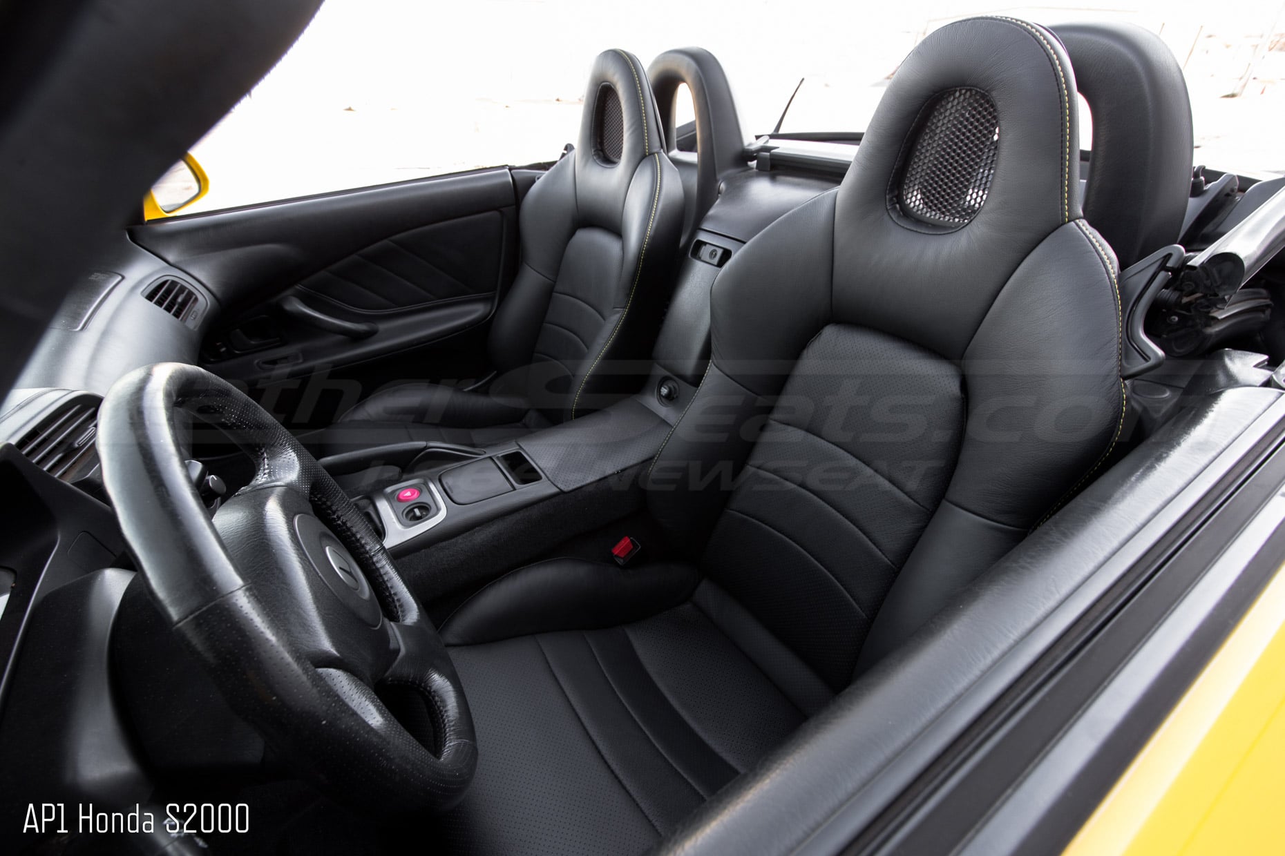 Backrest and headrest section of honda S2000 with installed leather seats