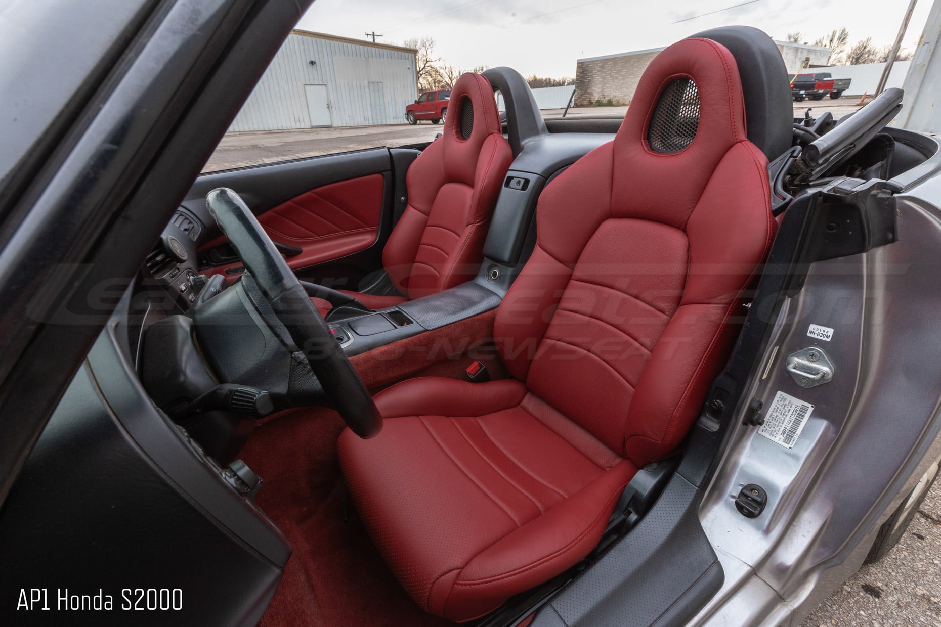 Honda S2000 with perforated Cardinal Red leather seats