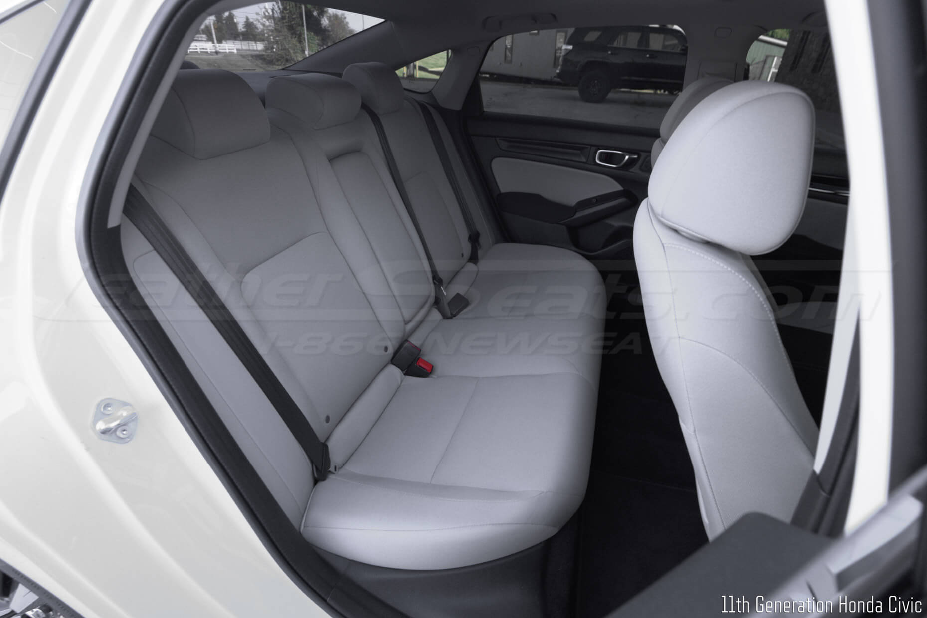 11th Generation honda civic with white cloth rear seats