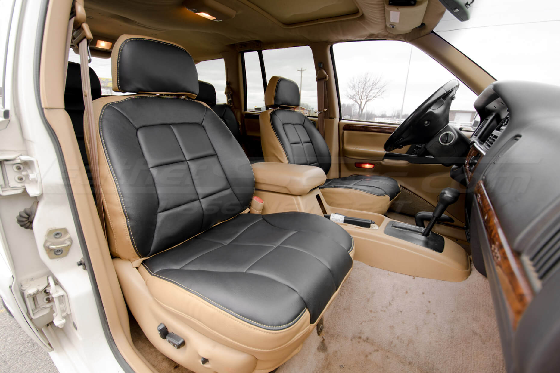 Custom replacement seat covers in doeskin and black for grand cherokee