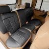 Rear seat ldoeskin and black leather upholstery installed for grand cherokee suv - rear seatss passenger side