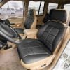 1996-1998 Jeep Grand Cherokee installed replacement leather seat covers in doeskin and black - front seats