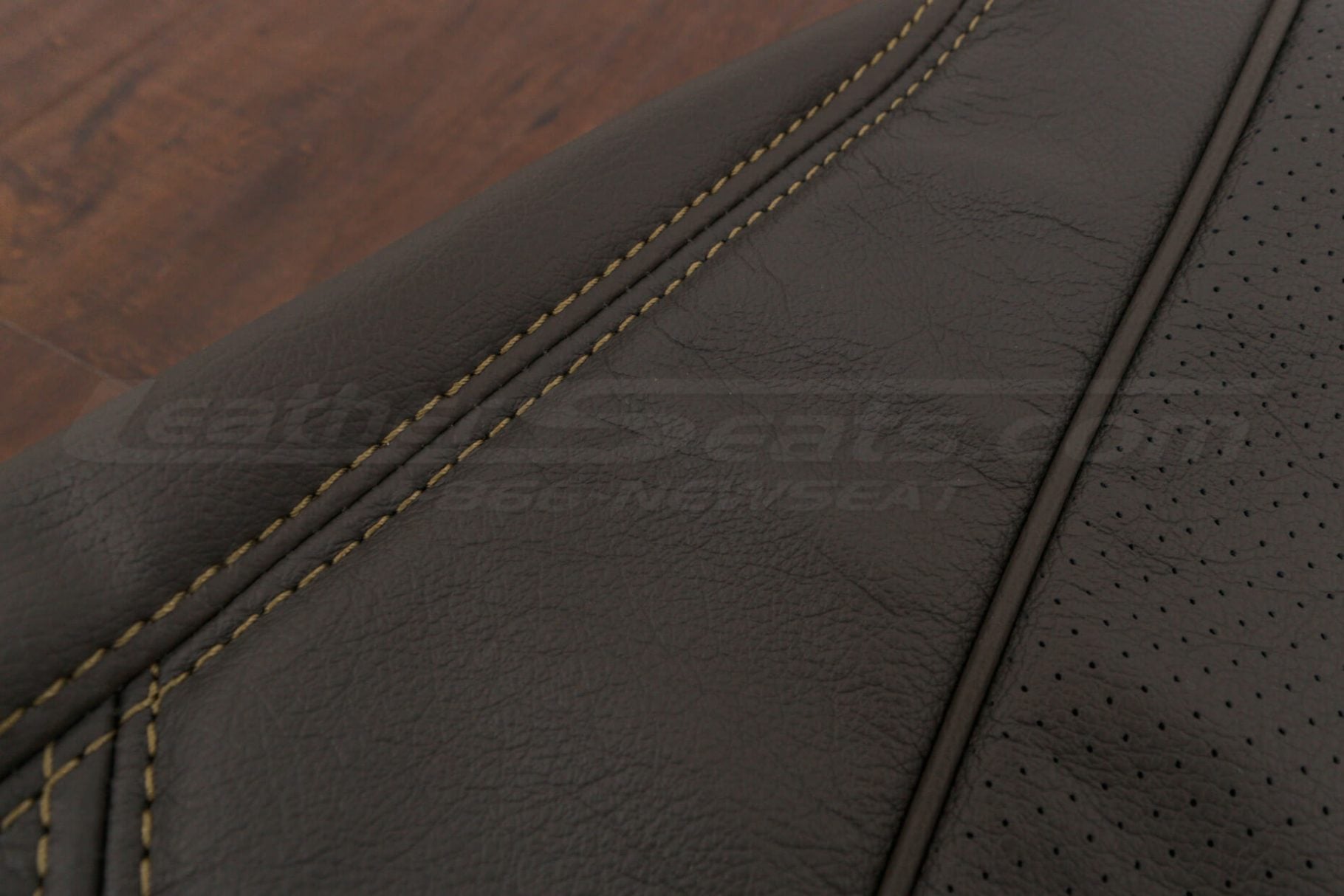 Contrasting Tan doulbe-stitching on Dark Brown leather
