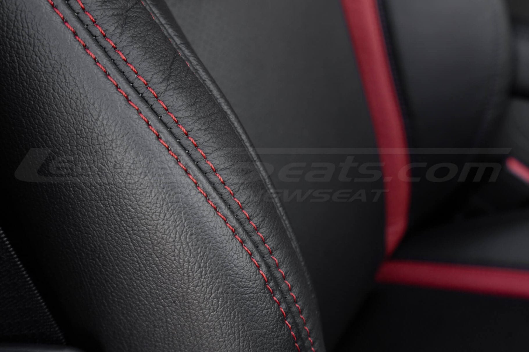 Contrasting Red stitching on black dodge charger interior