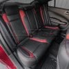 Dodge Charger with two-tone black and bright red leather seats installed