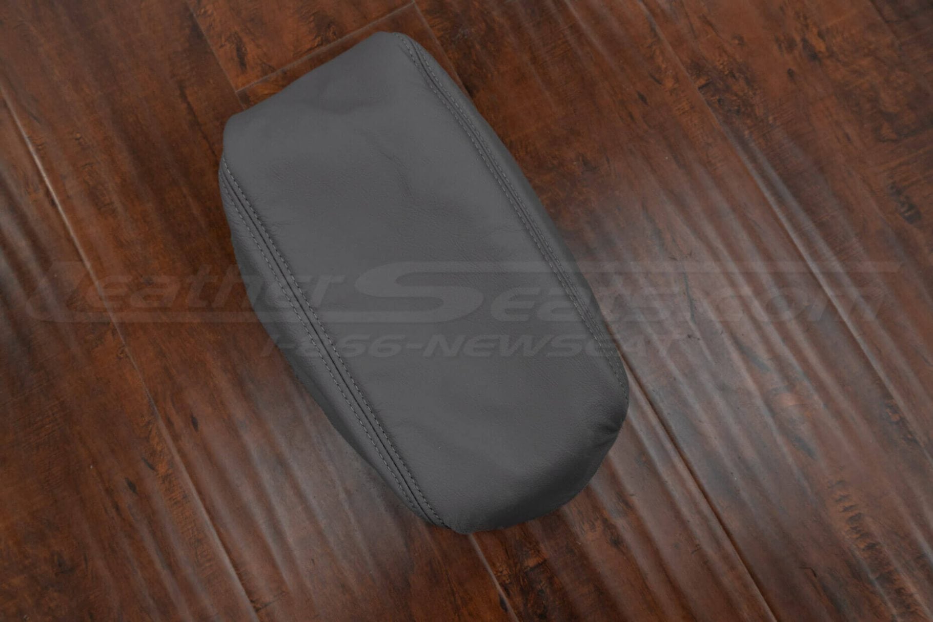 Top-down side view of afterkarket console lid upholstery for lxx470