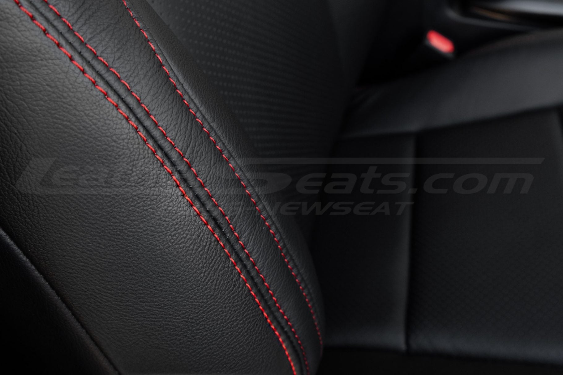 Contrasting Cardinal double-stitching on Black leather