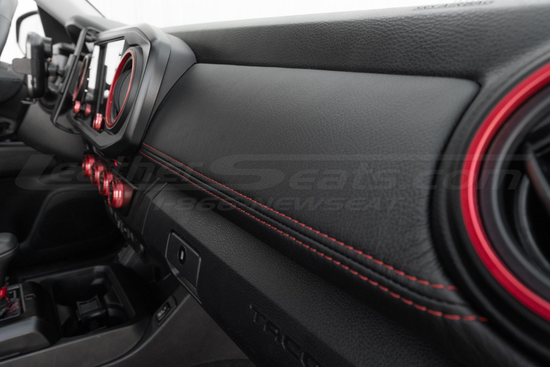 Close up of leather dash insert of toyota tacoma
