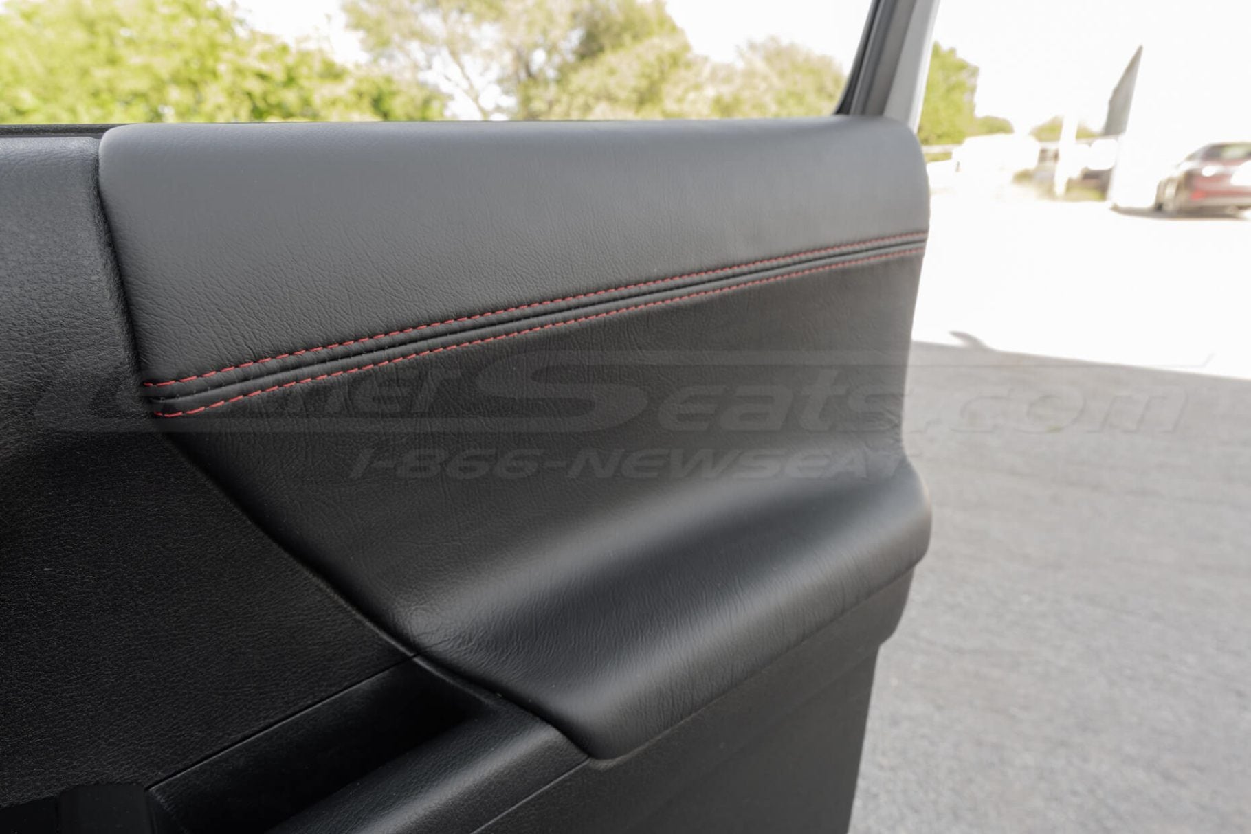 2016-2023 Toyota Tacoma leather door panel inserts in black with red stitching
