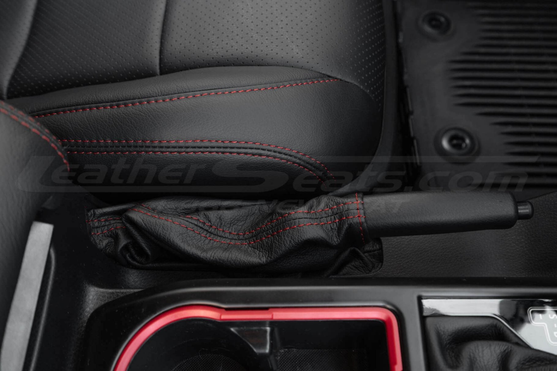 Aftermarket leather e-brake boot in black leather with red stitching for tacoma trucks