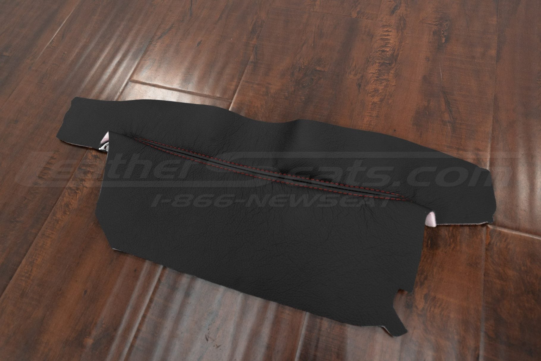 Black dash insert leather upholstery with contrasting red stitching