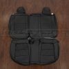 Aftermarket Hyundai Accent black leather seats - rear seat upholstery