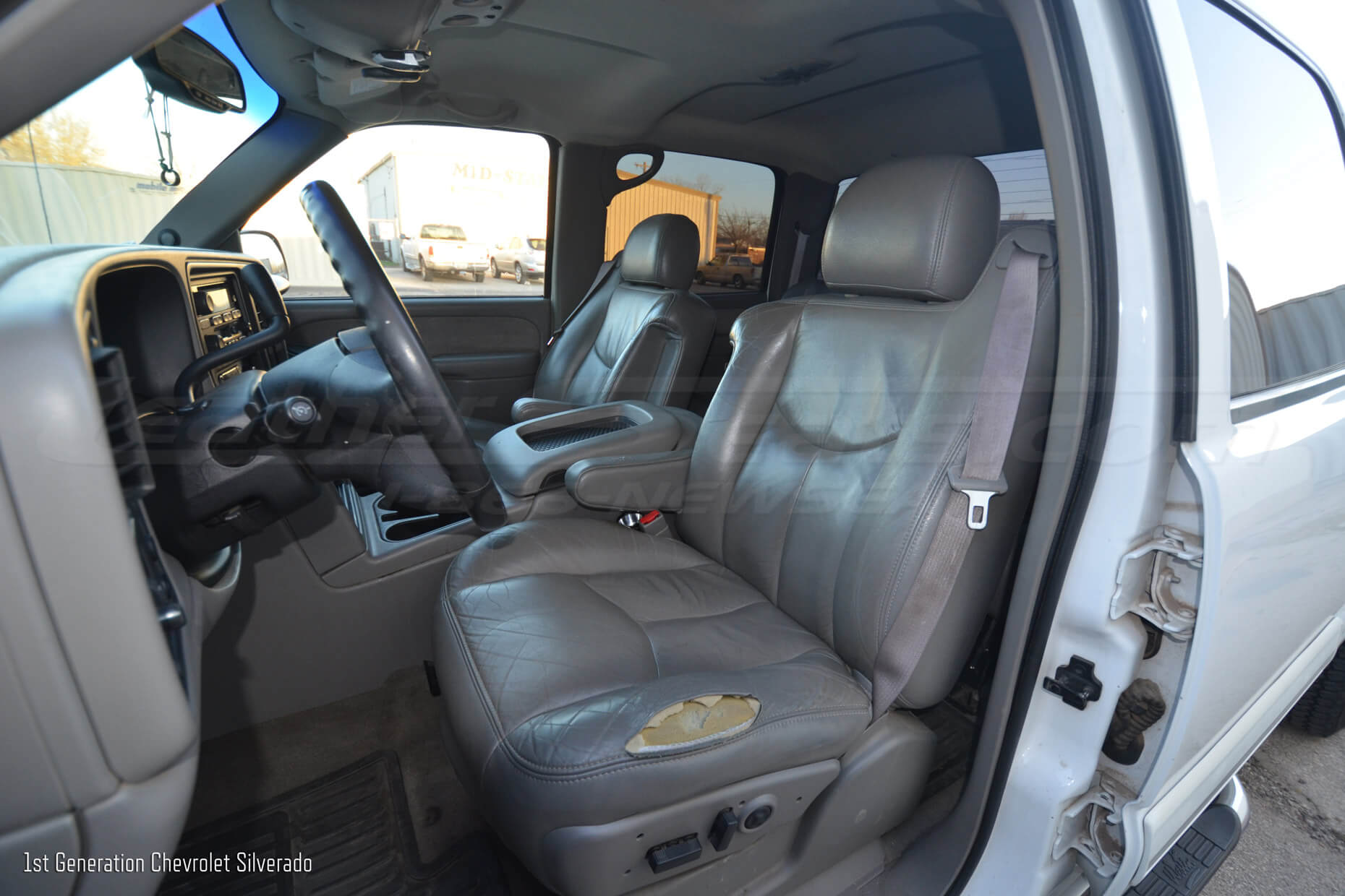 1st Generation Chevy Silverado with torn leather seats