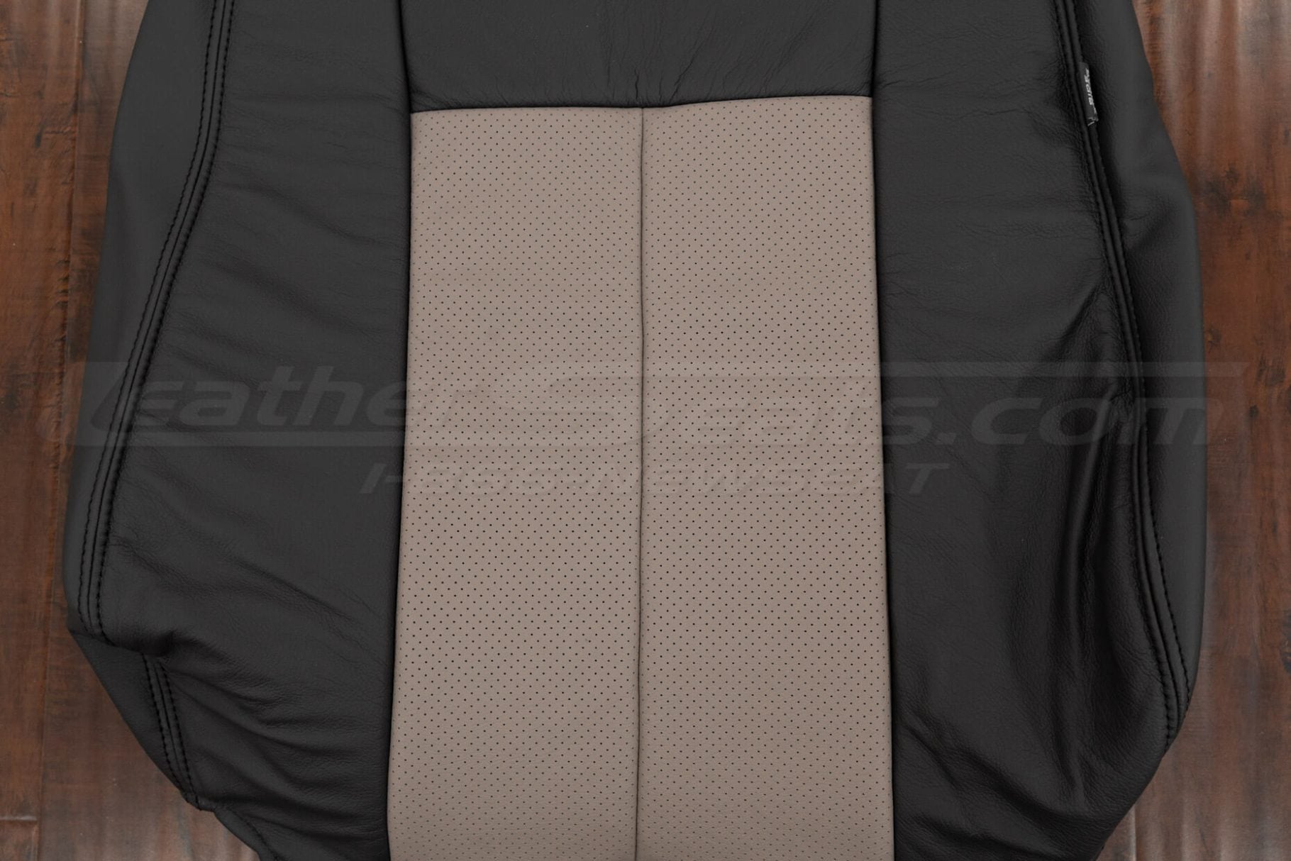 Perforated combo section of Ford Expedition backrest upholstery