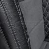 Contrasting Lapis double-stitching on black leatherr close-up