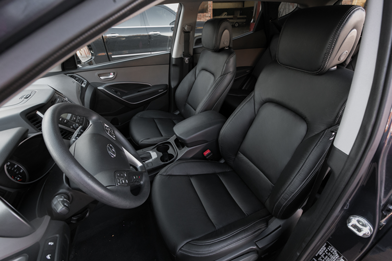 2013-2018 Hyundai Santa Fe with black leather seats - featured