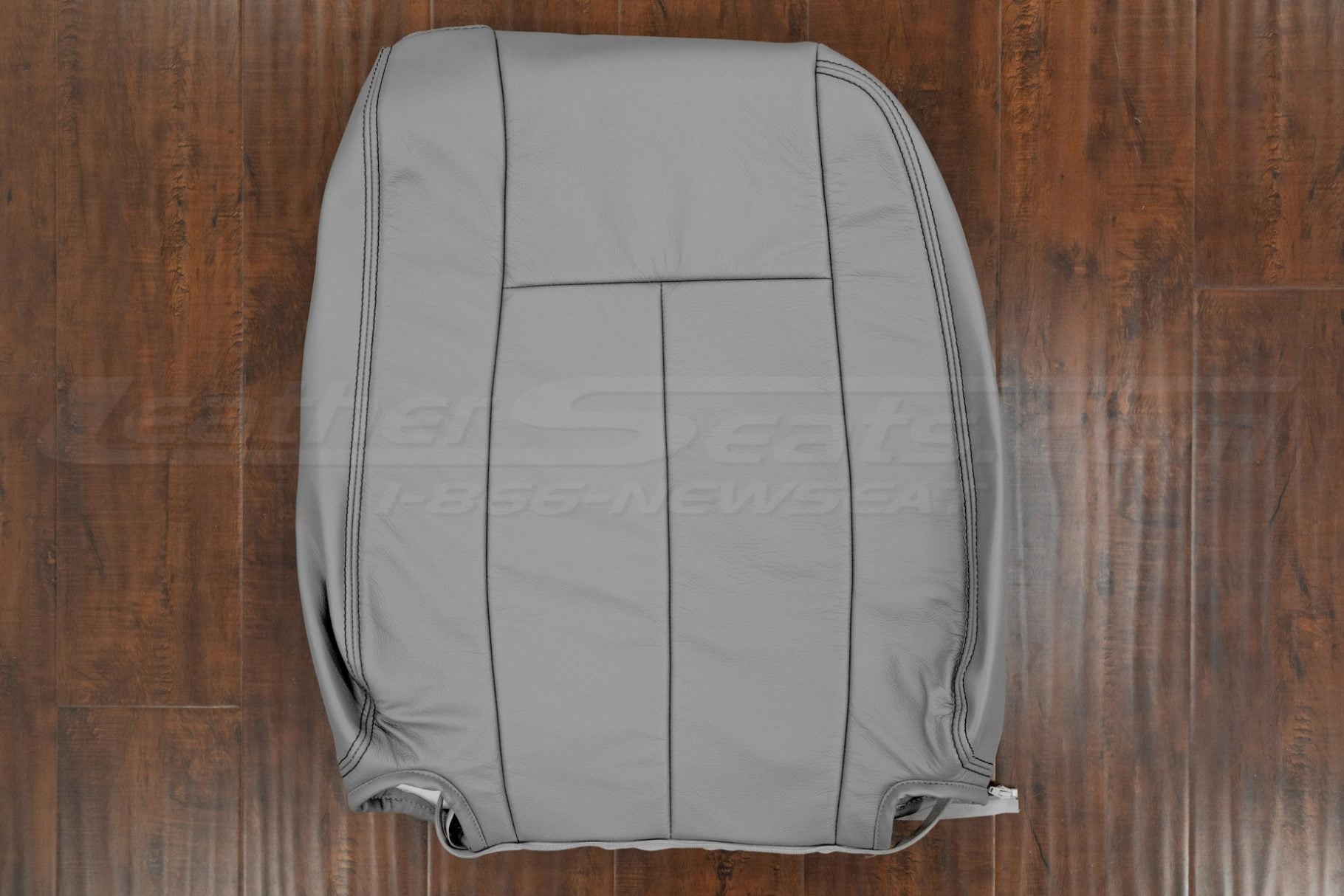 Ash leather backrest with contrasting black double stitching