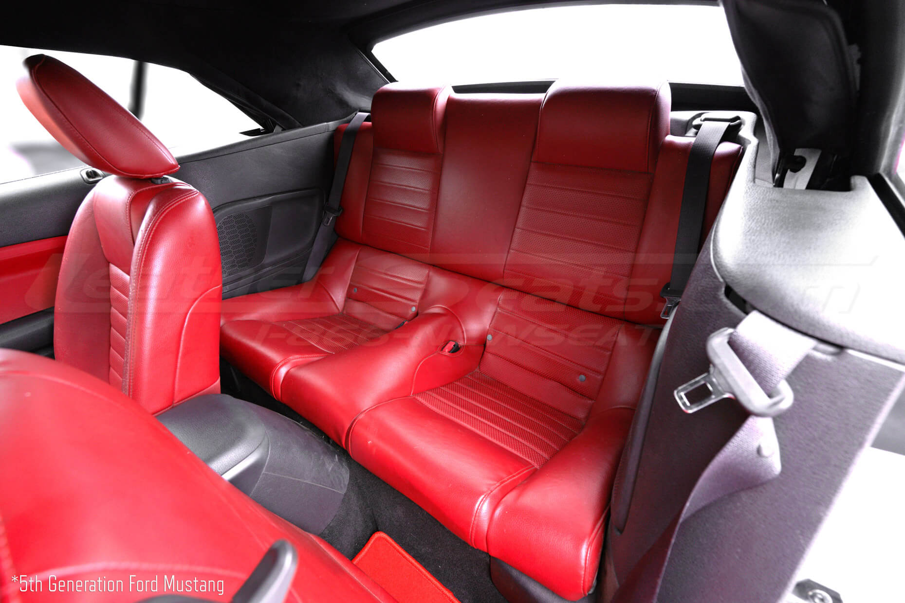 5th generation ford mustang with factory bright red lleather seats - rear seats