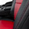 Red double-stitching on contrasting Black leather