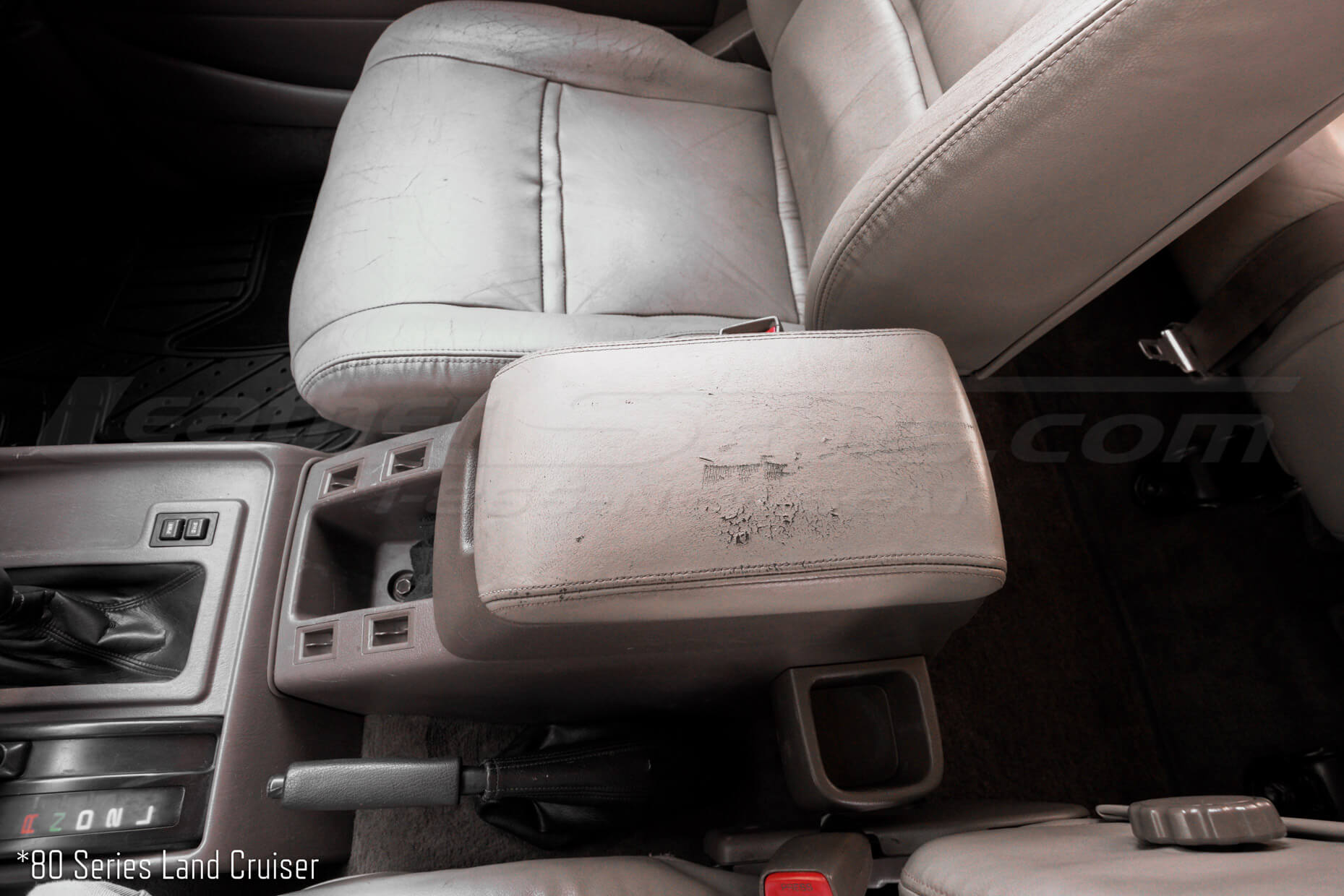 80 Series Toyota Land Cruiser with cracked factory console cover