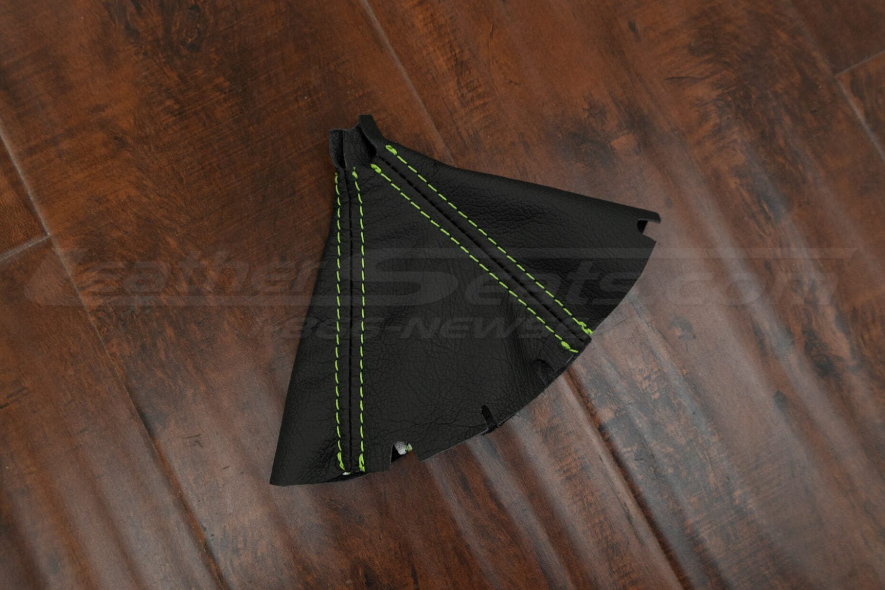 Black leather shift boot with contrasting lime green double stitching