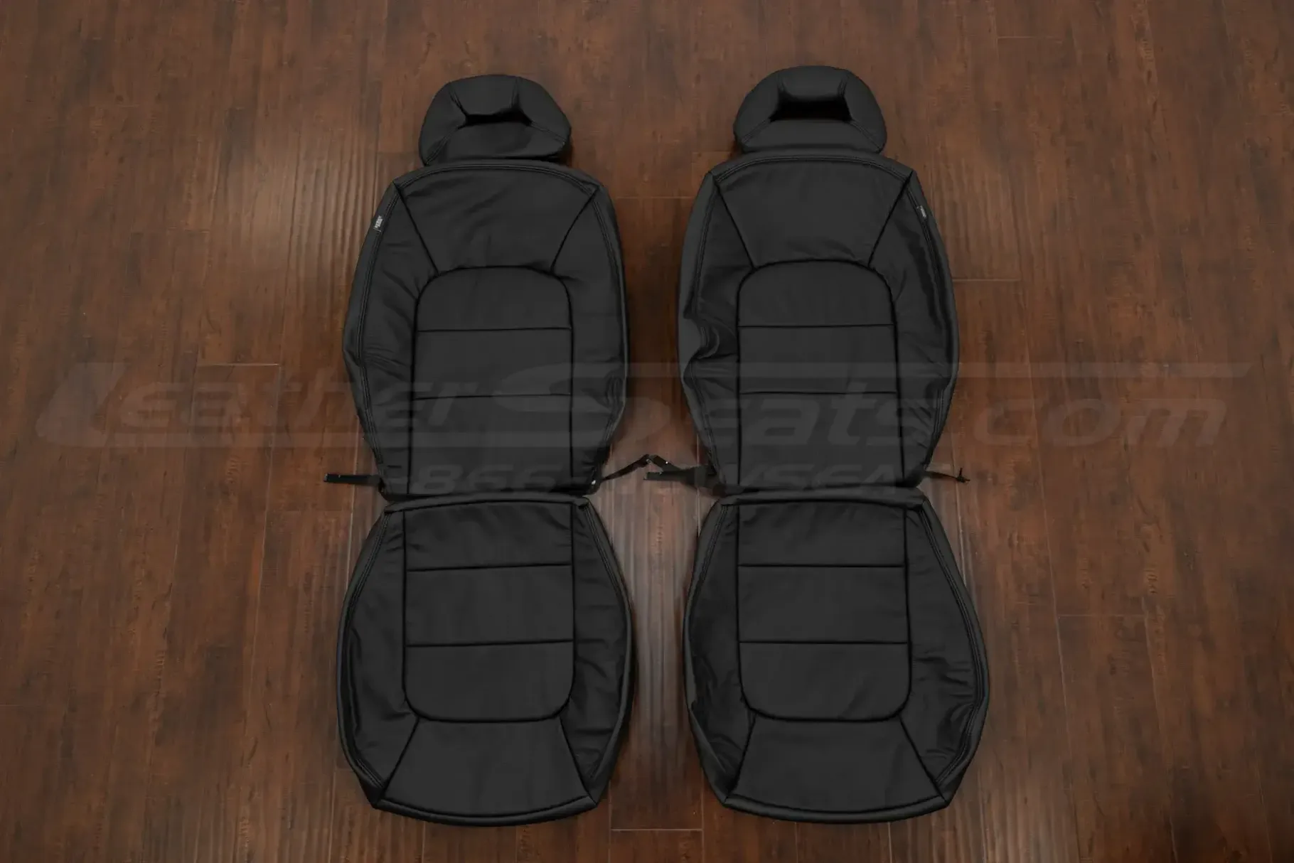 Black Volkswagen Beetle replacement leather seat covers. Front seat upholstery