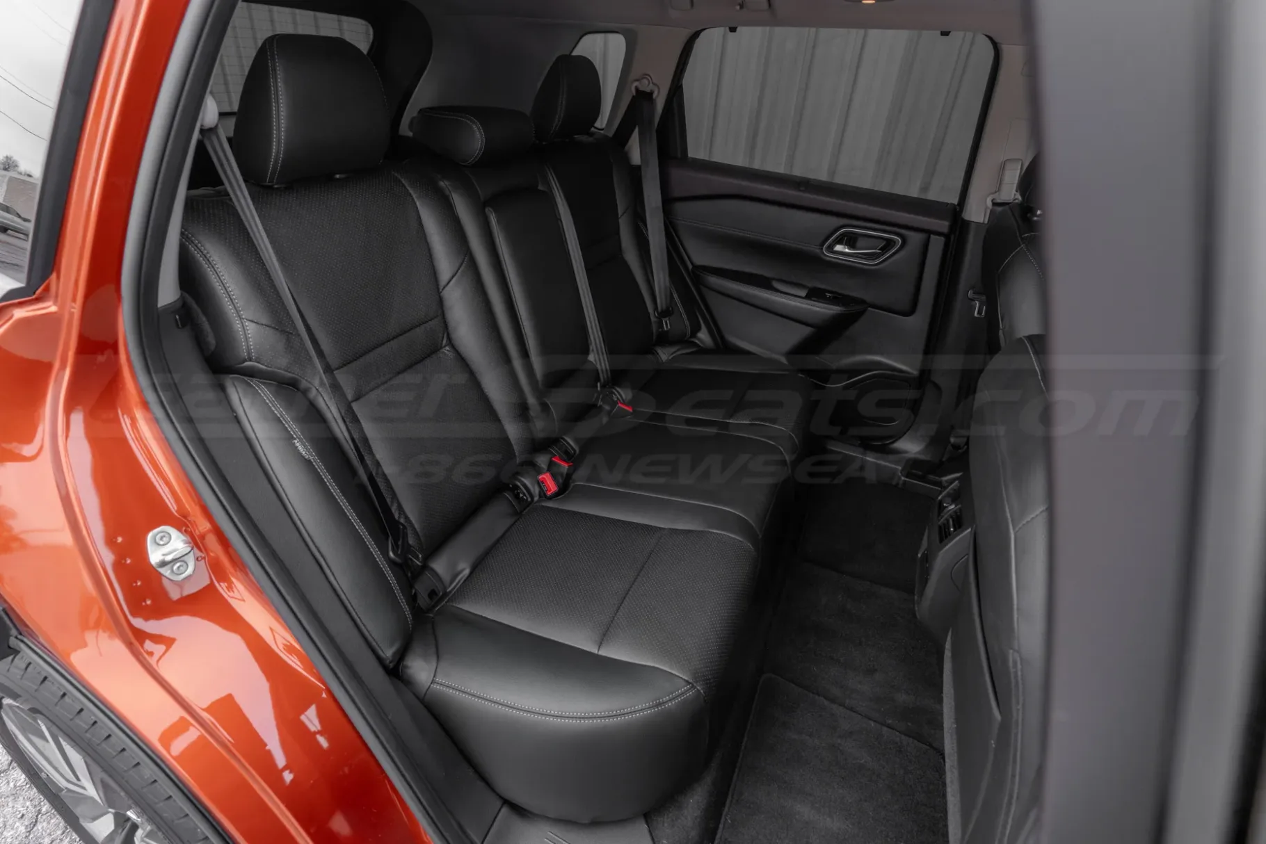 Nissan Rogue with black aftermarket leather seats