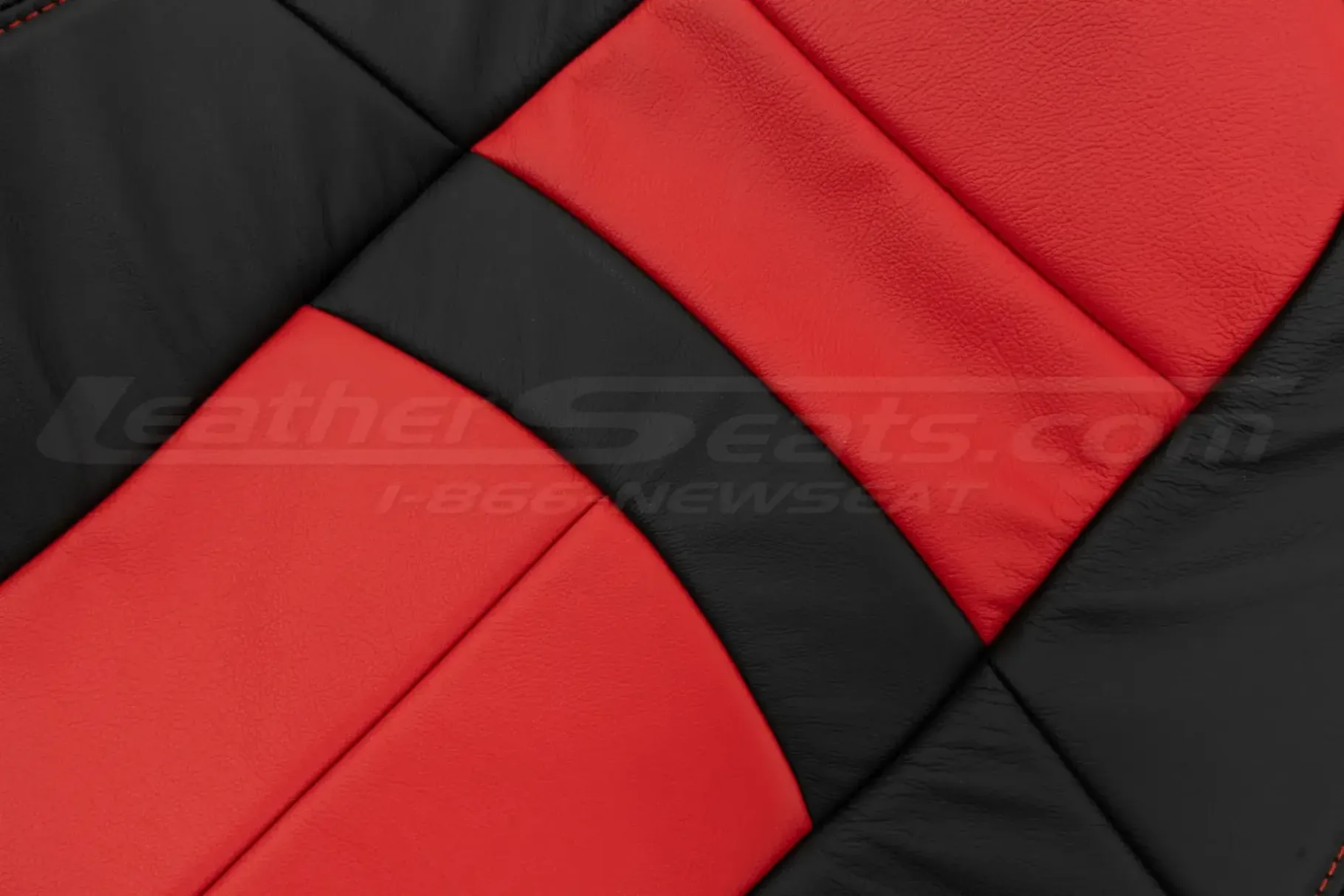 Black & Bright Red automotive leather close-up