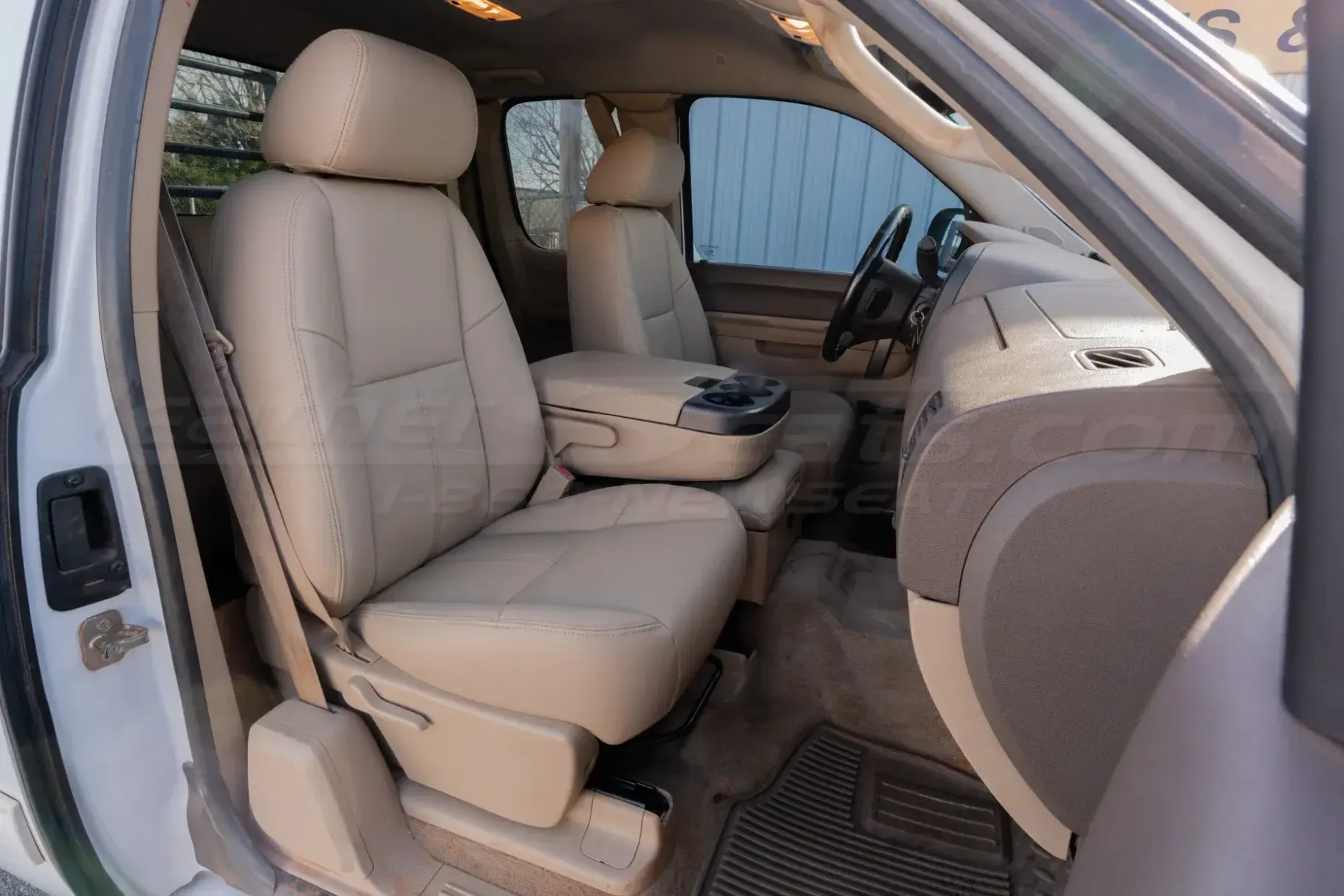 GMC Sierra front buckets with sandstone leather installed