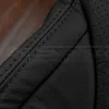 Matching black double-stitching on black leather