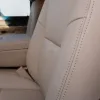 Sandstone automotive leather with matching Sandstone double-stitching