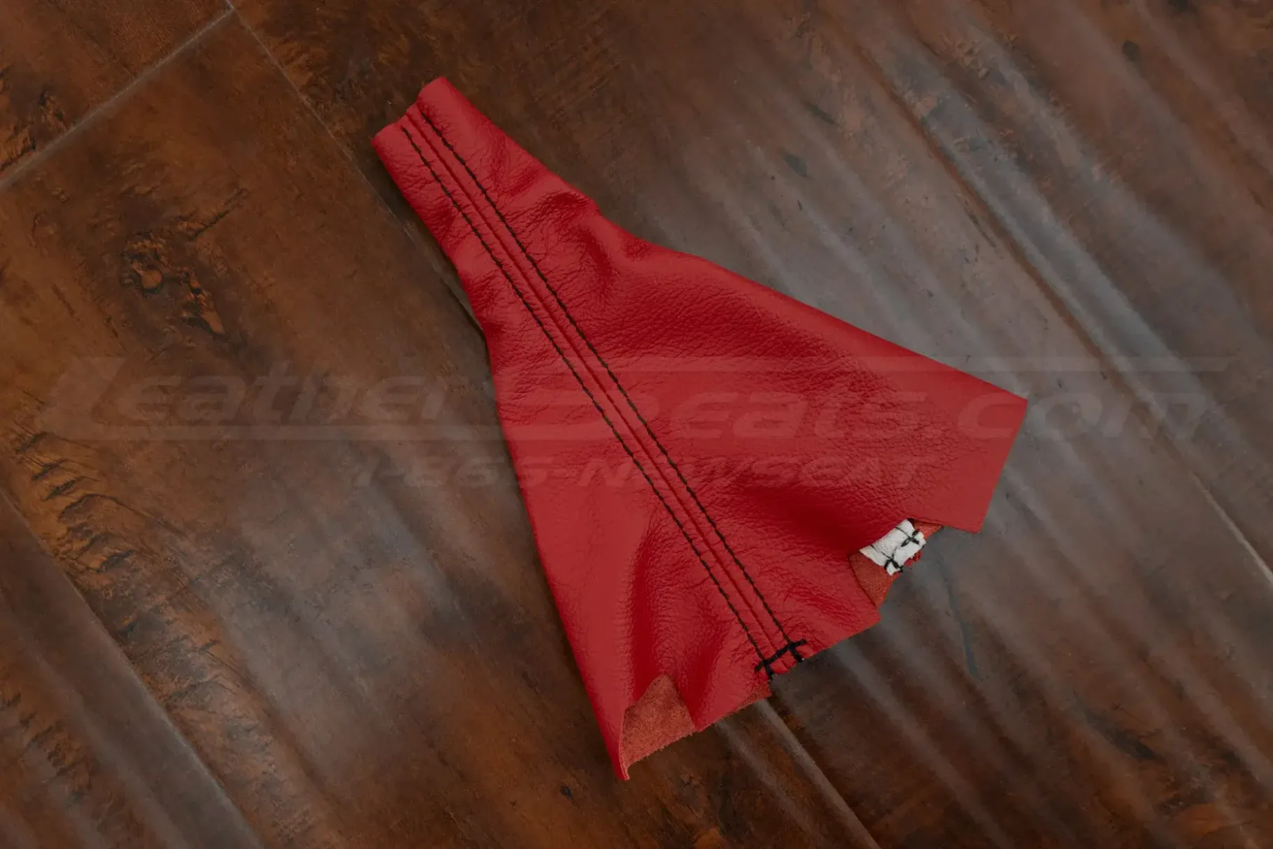 Red shift boot upholstery with black stitching