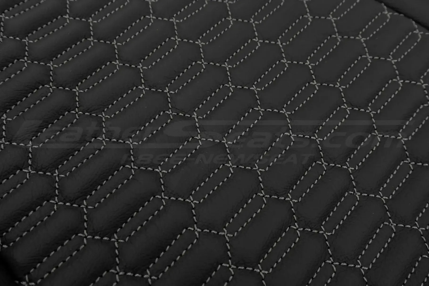 CNC stitched interlaced hex pattern close-up