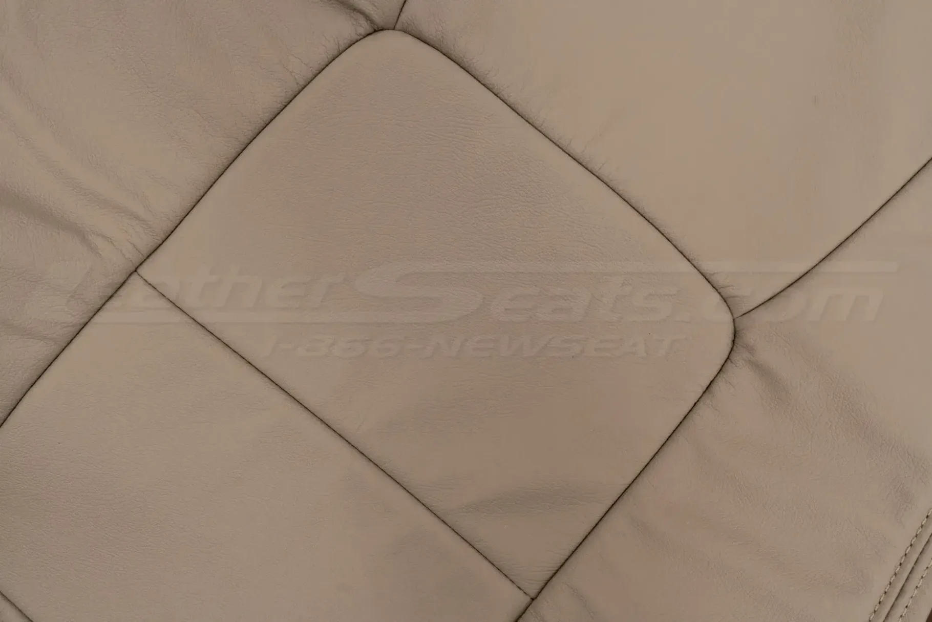 Ivory automotive leather texture close-up