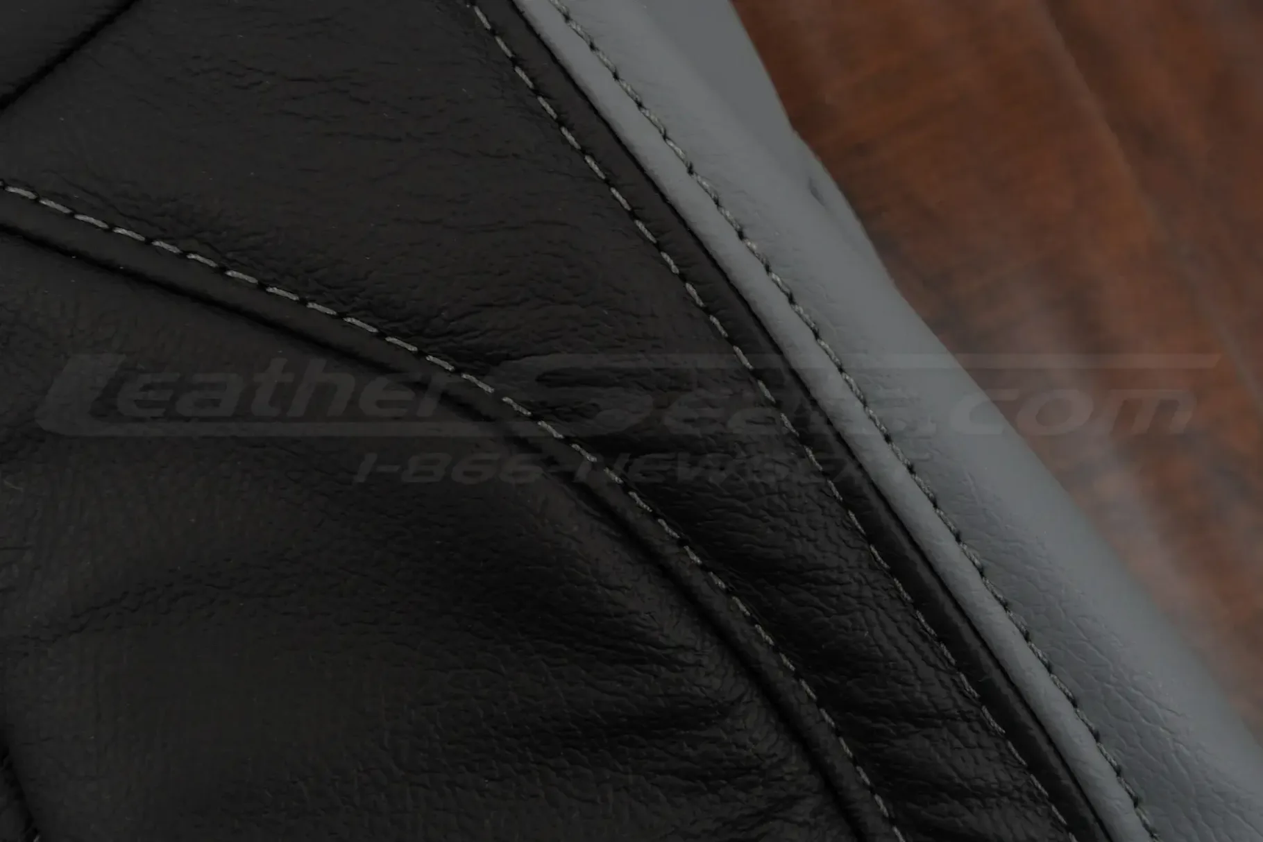 Contrasting Light Grey stitching on Black and Light grey leather