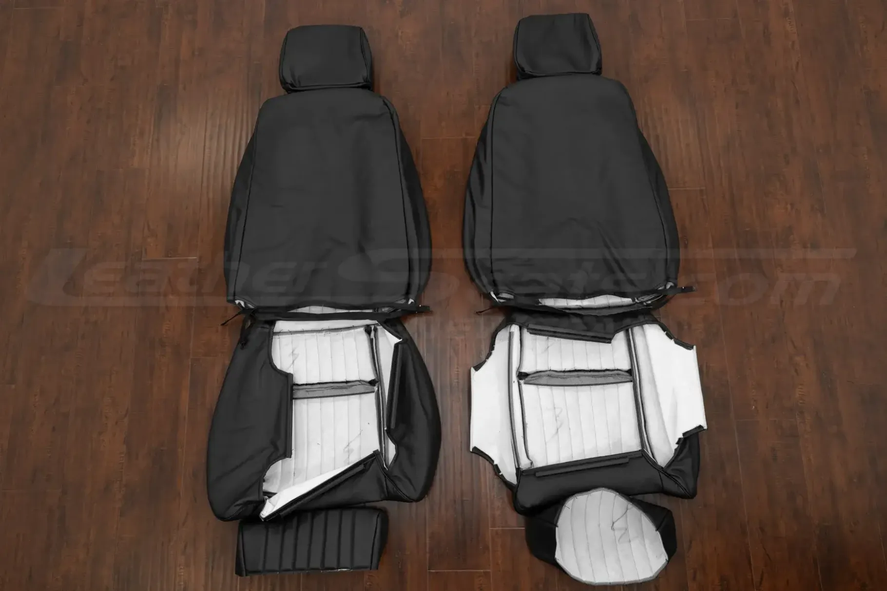 Front seat upholstery with leg extensions flipped