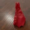 Red Civic manual shifter with black double stitching