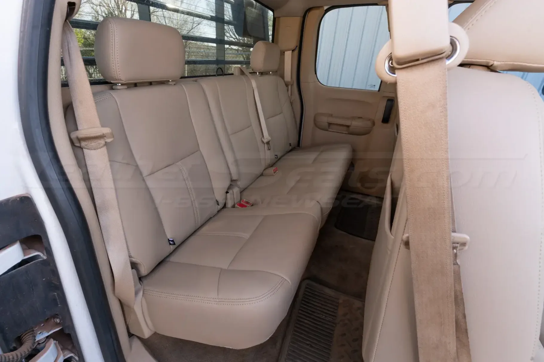 Replacement rear seat leather covers for GMC Sierra installed