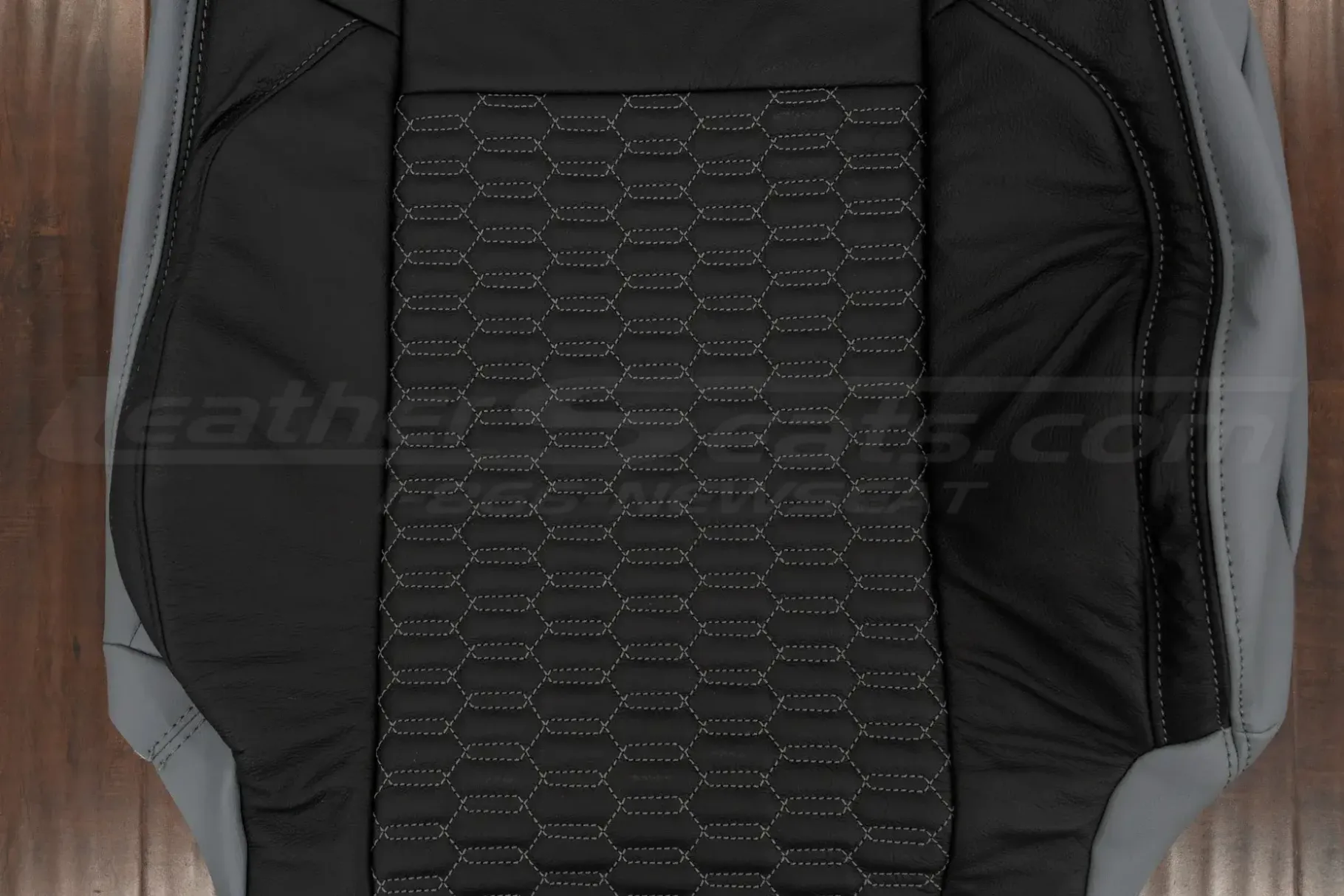 Interlaced Hex inserts on black leather with light grey stitching