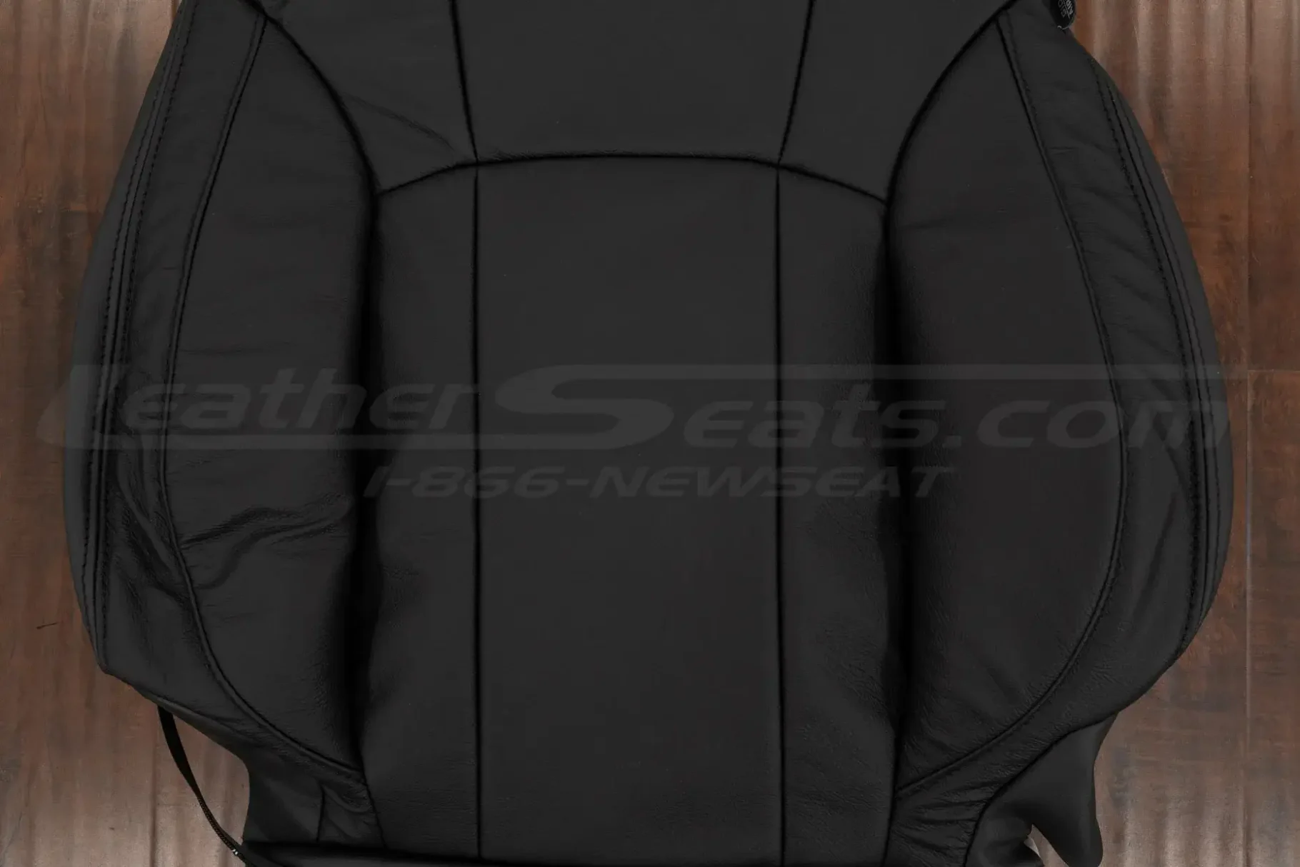 Aftermarket automotive grade leather texture on backrest upholstery